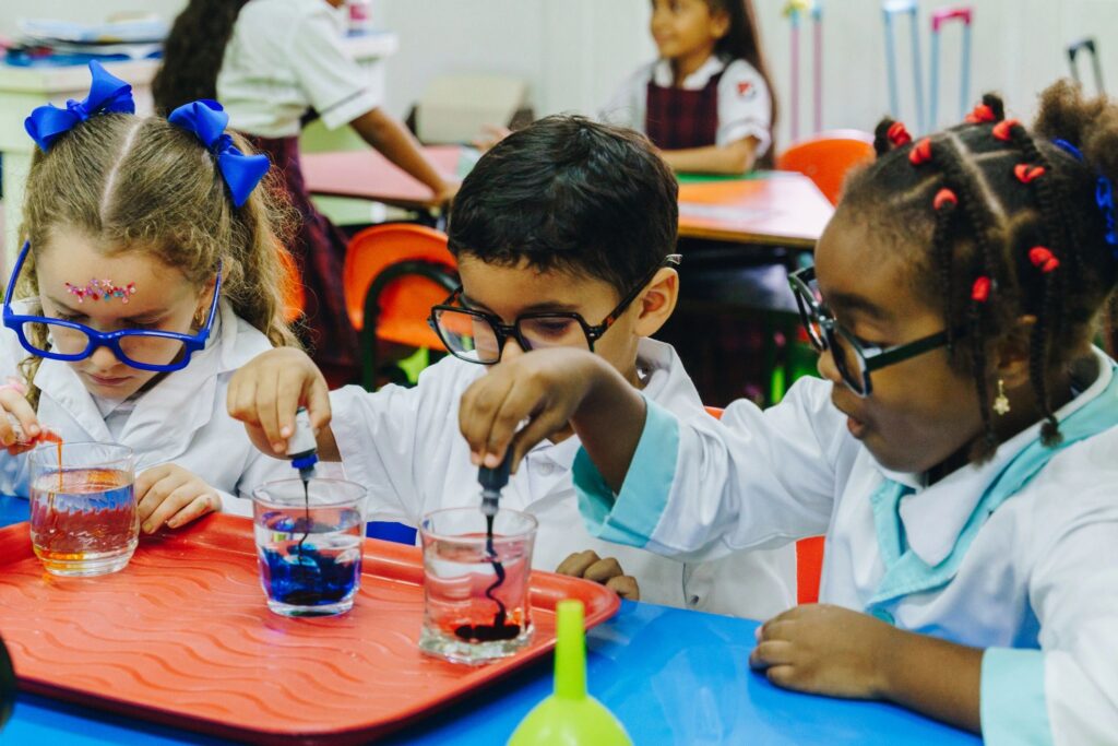 Children conducting a scientific experiment in the school laboratory