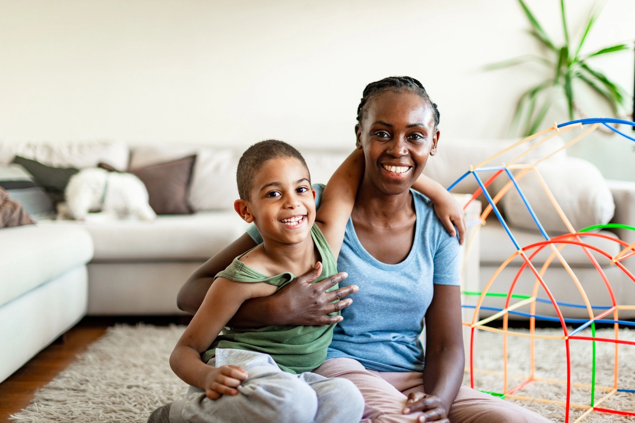 Black mother and child sharing a warm moment at home
